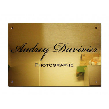 Plaque murale en laiton