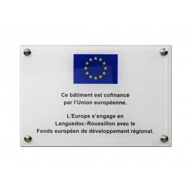 Plaque d'inauguration avec logo